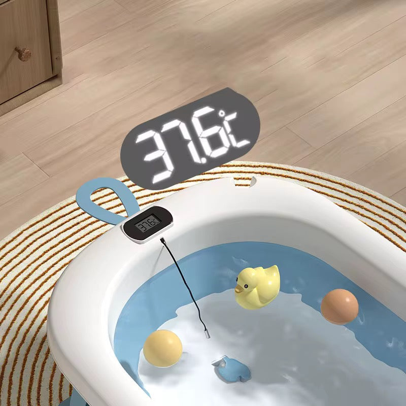 Baignoire agréable avec coussin de bain et thermomètre