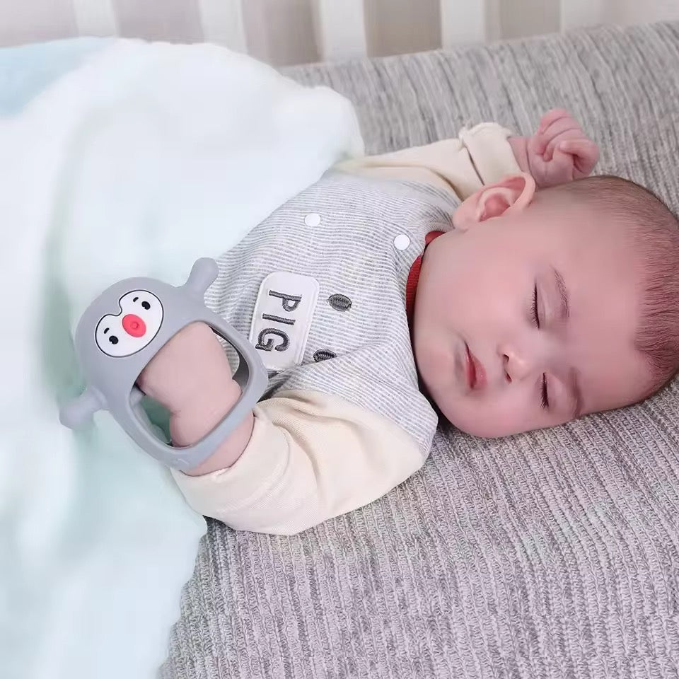 Jouet de dentition pingouin en silicone ( 4 coduleurs dispo)