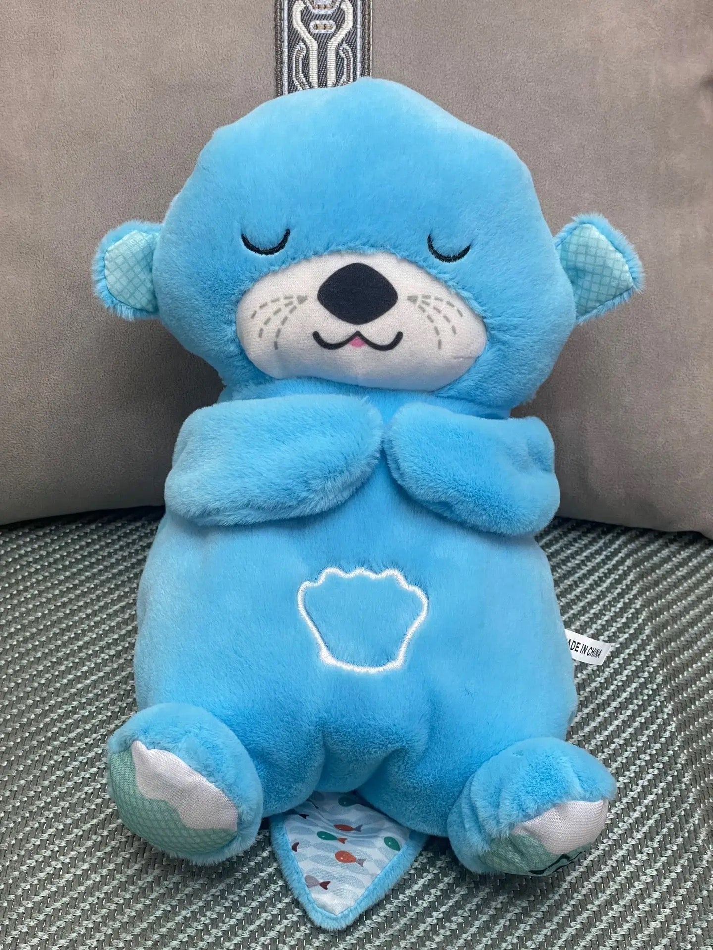 Peluche respirante, sonore et lumineuse