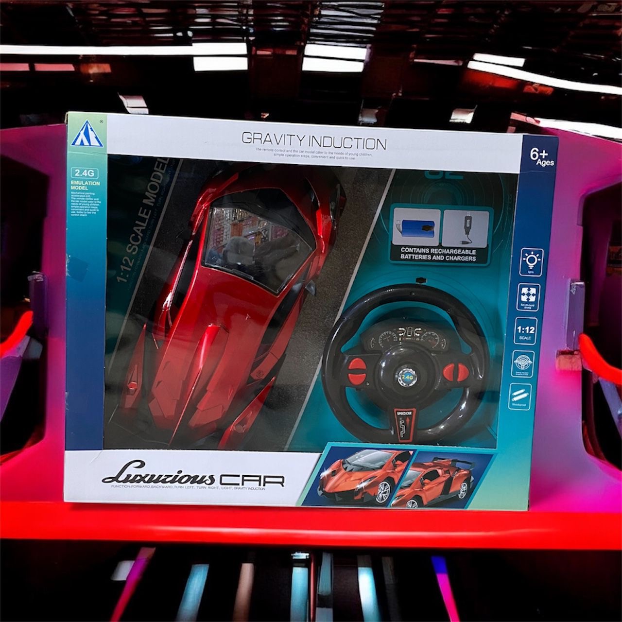 Voiture Télécommandée Sportive 1:12 – Modèle Rechargeable avec Volant de Contrôle